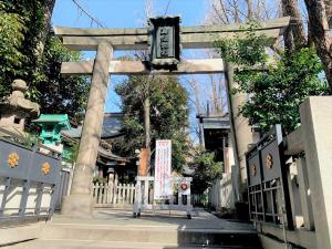 a large stone arch with a clock on it at 台東区 駅から徒歩3分施設3f in Tokyo +11 photos