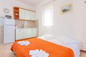 Posteľ alebo postele v izbe v ubytovaní Guest House Davor Tomas