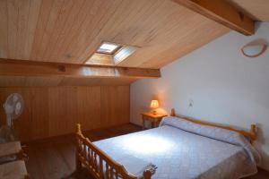 Katil atau katil-katil dalam bilik di Motel de Porticcio
