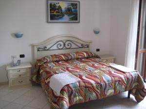 Posteľ alebo postele v izbe v ubytovaní Scano Comfort Inn