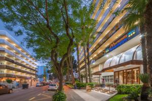 a rendering of a street with a building at Hotel Marinada in Salou