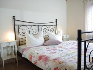 Ένα ή περισσότερα κρεβάτια σε δωμάτιο στο Ferienwohnung Flora