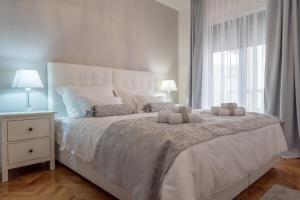 Postel nebo postele na pokoji v ubytování Villa Solis