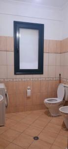 Ένα μπάνιο στο Hasimaj apartament