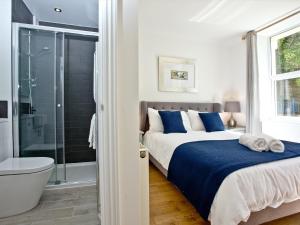 Un ou plusieurs lits dans un hébergement de l'établissement 5 Devon Beach Court