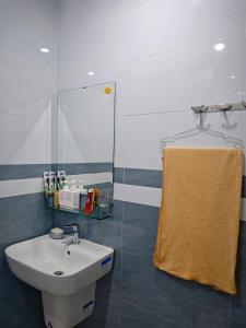 Koupelna v ubytování Mani House + 14 fotografií