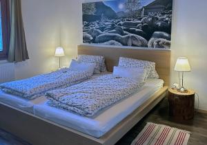 Posteľ alebo postele v izbe v ubytovaní Haus Berta, Montafon