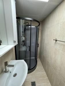 Koupelna v ubytování Hotel Hermes + 18 fotografií