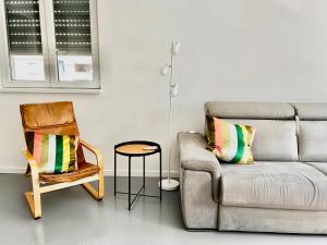 Ruang duduk di Elegante Monolocale al Mare +2 gambar