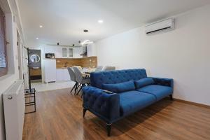 Η κουζίνα ή μικρή κουζίνα στο Apartman Ria
