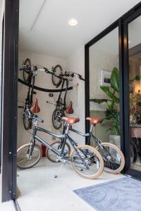 two bikes parked next to each other in a room at Hotel Pacific Kanazawa in Kanazawa