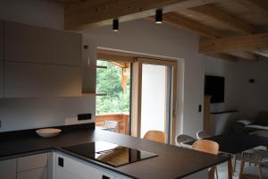 Kuchyň nebo kuchyňský kout v ubytování LUSE Living
