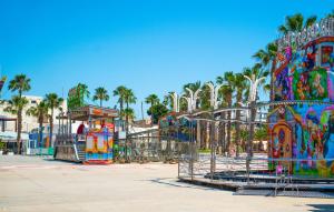 a playground in a park with a roller coaster at Villa Soleada in San Pedro del Pinatar