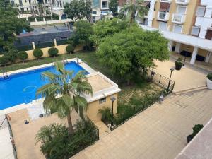 Bazén v ubytování TERRASOL TORRELITORAL APARTAMENTO 3 DORMITORIOS DE LUJO nebo v jeho okolí