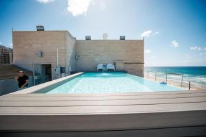 Πισίνα στο ή κοντά στο Shani house of style shunit penthouse
