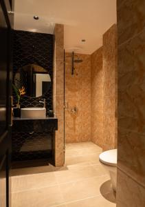 Et badeværelse på Grand Beach Nha Trang hotel - 그랜드 비치 호텔 나트랑