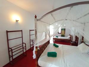 Ένα ή περισσότερα κρεβάτια σε δωμάτιο στο Chenaya Guest House