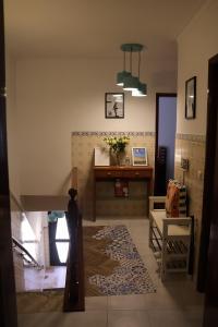 a living room with a table and a couch at BBA1 Appartement climatisé centre-ville Ferrel in Ferrel +42 photos