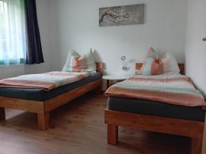 Postel nebo postele na pokoji v ubytování Ferienwohnung Brigitte