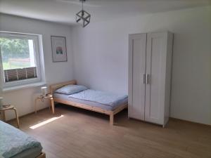 Ένα ή περισσότερα κρεβάτια σε δωμάτιο στο Ferienwohnung Mescherin 4