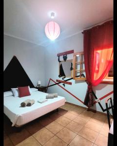 Letto o letti in una camera di Eden GuestHouse