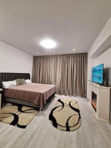 Ένα ή περισσότερα κρεβάτια σε δωμάτιο στο Rin grand 1 room luxury