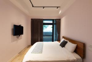 Postel nebo postele na pokoji v ubytování Bondi Homestay