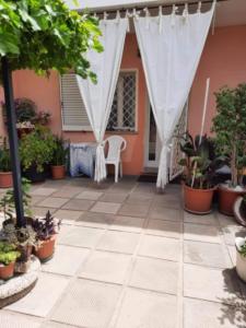 En have udenfor Casa ERMINIA