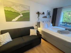 Postel nebo postele na pokoji v ubytování Ausblick in den Bayerischen Wald - Moderne Ferienwohnung