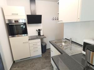 Kuchyň nebo kuchyňský kout v ubytování Ferienwohnung Auszeit-Wiesenblick