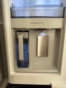 a drawer in a refrigerator with a bevegas center at Casa de Leon Lakeview Guesthouse in Mississauga
