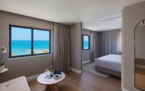 Seanergy Boutique & Spa Hotel客房内的一张或多张床位