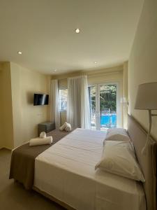 Postel nebo postele na pokoji v ubytování Corfu valley view