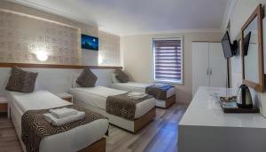 A television and/or entertainment centre at City Hotel Plovdiv