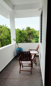 Balkón nebo terasa v ubytování Surya Villa Guesthouse