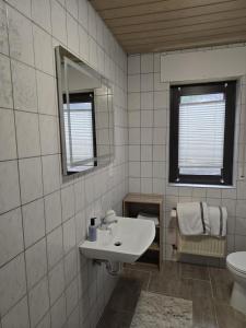 Ένα μπάνιο στο Ferienwohnung an Rhein und Mosel