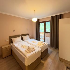 Postel nebo postele na pokoji v ubytování Labarum Guesthouse