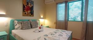 Postel nebo postele na pokoji v ubytování Las Palmas Eco Residence