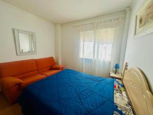 Ένα ή περισσότερα κρεβάτια σε δωμάτιο στο Apartamento junto a la playa en la mejor ubicación de Denia