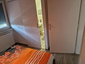Postel nebo postele na pokoji v ubytování Apt Lublana