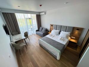 Giường trong phòng chung tại Meloso