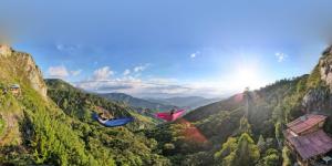 a person sleeping in a hammock in the mountains at La Ramada in Abejorral +34 photos