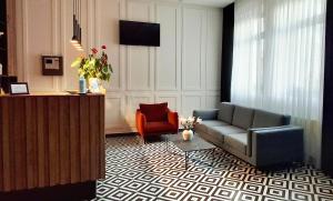 Televisyen dan/atau pusat hiburan di Roa Guesthouse