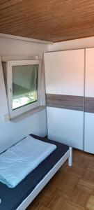 Postel nebo postele na pokoji v ubytování 2-Zimmer 1