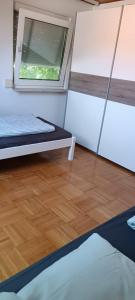 Postel nebo postele na pokoji v ubytování 2-Zimmer 1