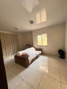 En eller flere senge i et værelse på Casa Almeida - sinta em casa na Cop 30