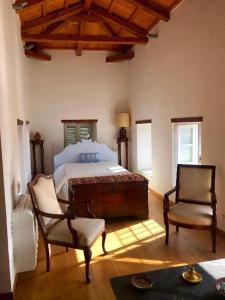 Postel nebo postele na pokoji v ubytování Inspiration Hydra