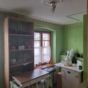 Kuchyň nebo kuchyňský kout v ubytování Kleine Auszeit am Rathaus + 11 fotografií