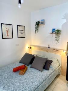 Ένα ή περισσότερα κρεβάτια σε δωμάτιο στο Quai N3 Studio, Parking, Vieux Port de La Ciotat