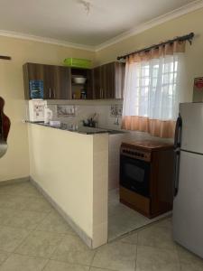 A cozinha ou cozinha compacta de Nest and key